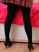 Opaque black pantyhose heels and cute tartan miniskirt