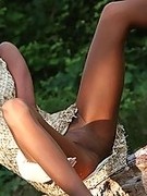 Sexy long MILF legs in nude pantyhose and heels outdoor